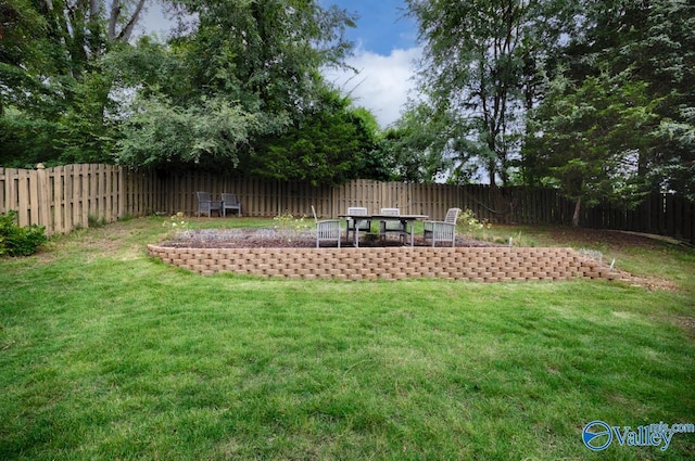 2906 Pasture View Ln, Owens Cross Roads, AL 35763 - fenced backyard featuring a patio