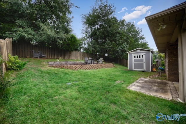 2906 Pasture View Ln, Owens Cross Roads, AL 35763 - fenced backyard featuring a patio area and a shed