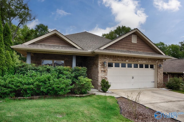 2906 Pasture View Ln, Owens Cross Roads, AL 35763 - view of front of house with a garage, driveway, roof with shingles, a front lawn, and brick siding