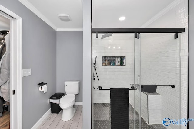 12956 Hickory Hills Rd, Athens, AL 35614 - bathroom with wood-type flooring, toilet, walk in shower, and crown molding