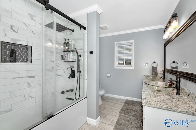 12956 Hickory Hills Rd, Athens, AL 35614 - full bathroom featuring vanity, toilet, ornamental molding, and bath / shower combo with glass door