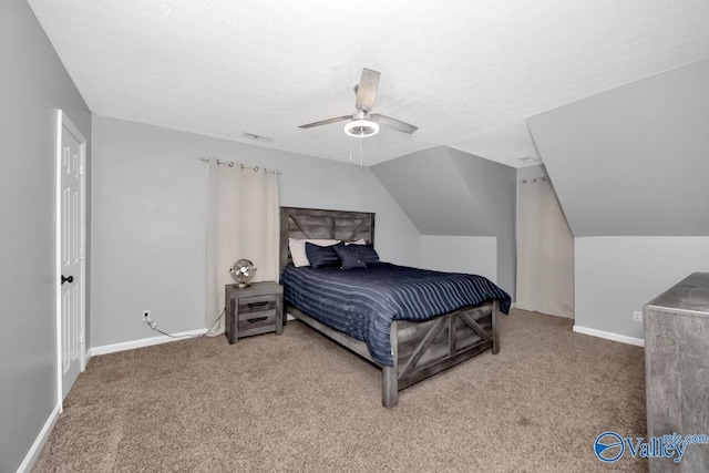 12956 Hickory Hills Rd, Athens, AL 35614 - carpeted bedroom featuring ceiling fan, lofted ceiling, and a textured ceiling