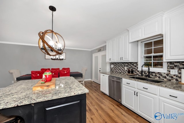 12956 Hickory Hills Rd, Athens, AL 35614 - kitchen with sink, white cabinetry, dishwasher, light hardwood / wood-style floors, and a kitchen island