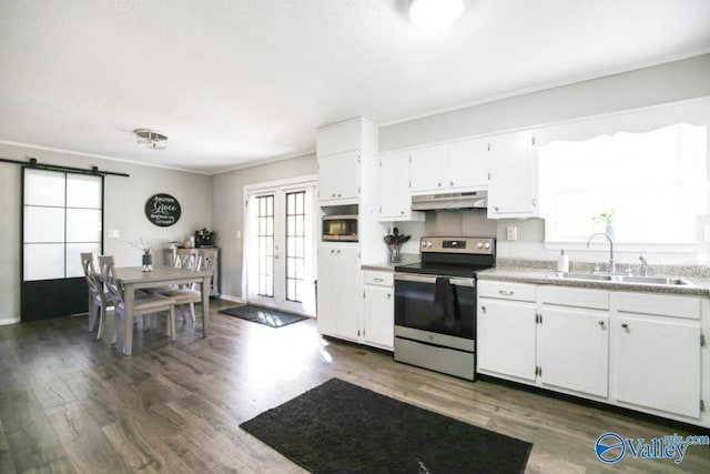 kitchen with white cabinetry, dark wood-type flooring, sink, and electric range