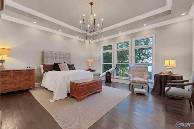 bedroom featuring crown molding, a tray ceiling, a chandelier, and dark hardwood / wood-style floors