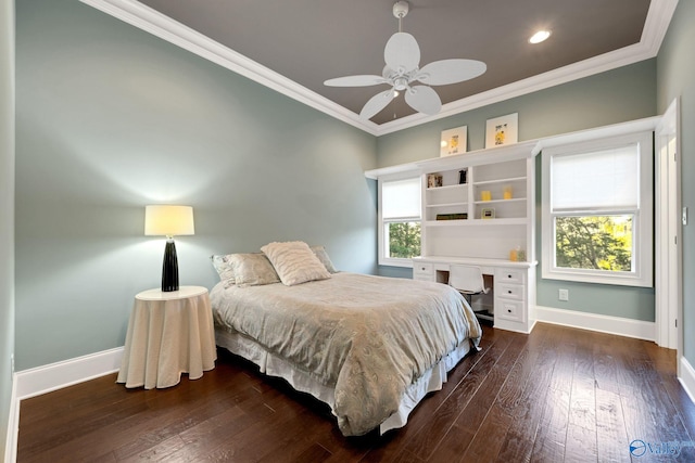 bedroom featuring crown molding, dark wood-type flooring, and ceiling fan