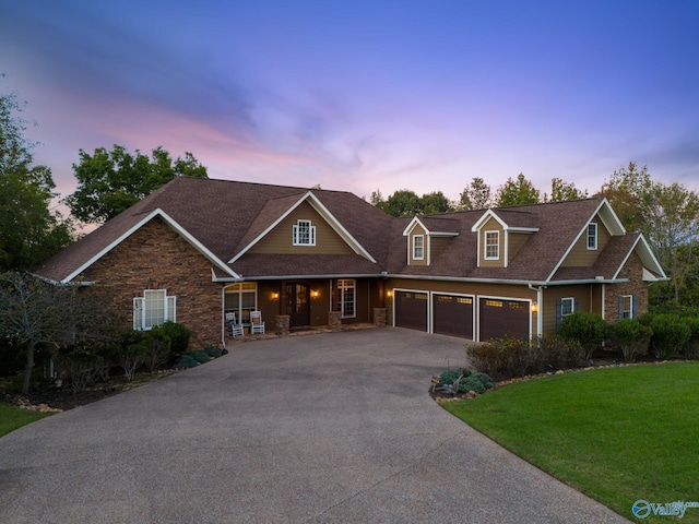 craftsman inspired home with a porch and a yard