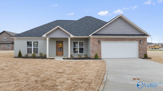 view of front of house with a garage and a front yard