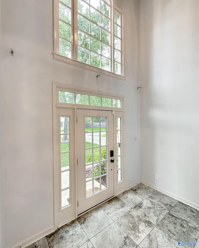 1509 Southampton Ct, Decatur, AL 35601 - foyer with a towering ceiling, healthy amount of natural light, and baseboards