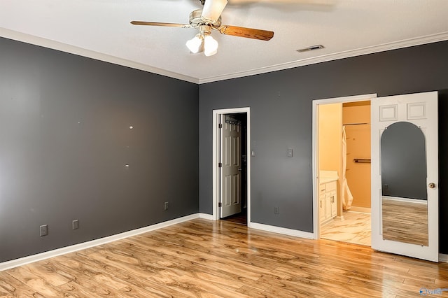 1509 Southampton Ct, Decatur, AL 35601 - unfurnished bedroom with light wood-style floors, ornamental molding, ensuite bathroom, baseboards, and ceiling fan