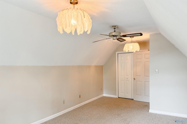 1509 Southampton Ct, Decatur, AL 35601 - bonus room featuring a chandelier, a ceiling fan, light colored carpet, baseboards, and lofted ceiling