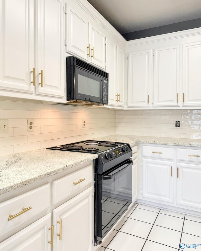 1509 Southampton Ct, Decatur, AL 35601 - kitchen featuring black appliances, white cabinetry, and decorative backsplash