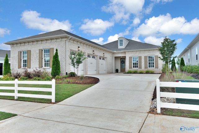 241 Farmhouse Dr, Madison, AL 35757 - view of front of property featuring driveway, an attached garage, and brick siding