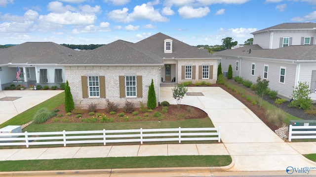 241 Farmhouse Dr, Madison, AL 35757 - view of front of house with brick siding, a shingled roof, and concrete driveway