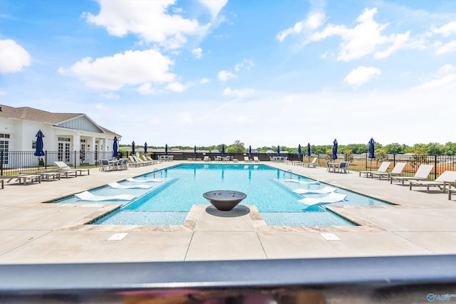 241 Farmhouse Dr, Madison, AL 35757 - community pool with a patio