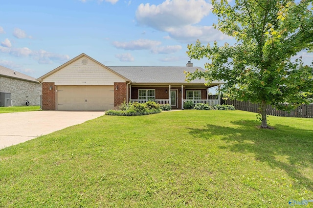 108 Landings Way Dr, Toney, AL 35773 - single story home with covered porch, brick siding, driveway, an attached garage, and a chimney