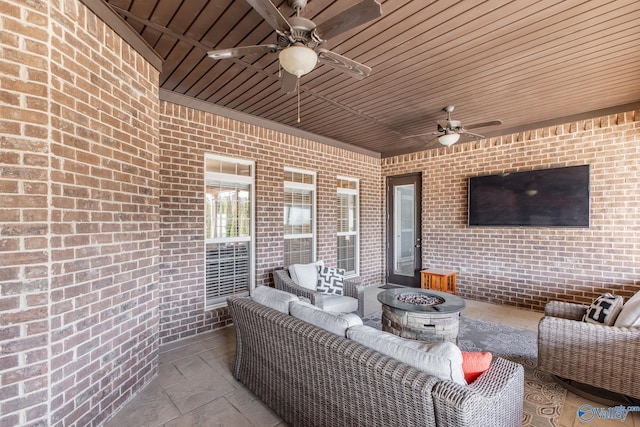 108 NW Rockhaven Dr, Madison, AL 35757 - view of patio with a ceiling fan and an outdoor living space with a fire pit
