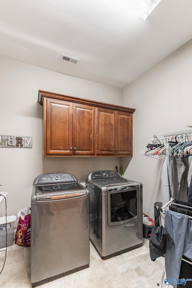 108 NW Rockhaven Dr, Madison, AL 35757 - washroom featuring washing machine and clothes dryer and cabinet space