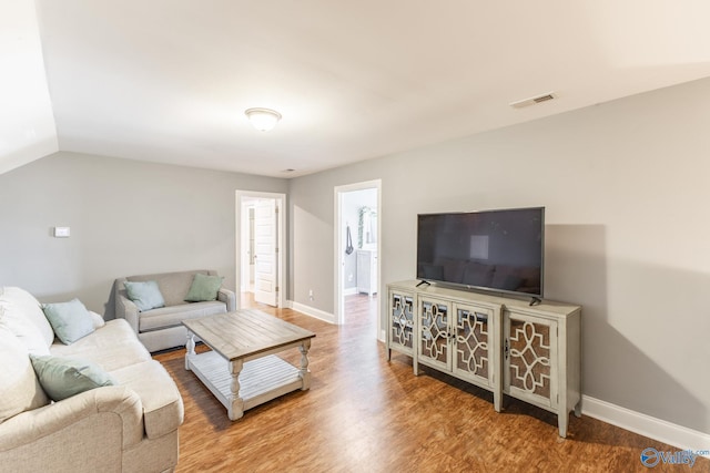 108 NW Rockhaven Dr, Madison, AL 35757 - living room featuring wood finished floors and baseboards