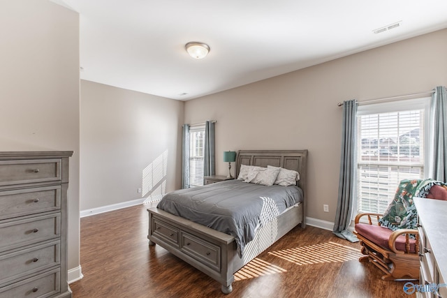 108 NW Rockhaven Dr, Madison, AL 35757 - bedroom featuring dark wood-type flooring and baseboards