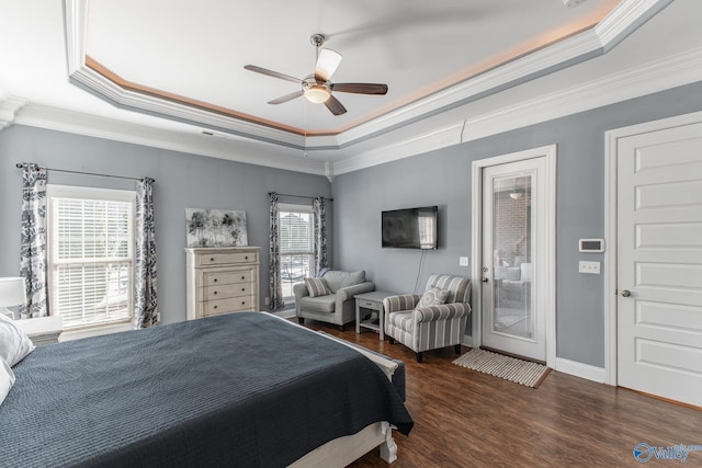 108 NW Rockhaven Dr, Madison, AL 35757 - bedroom with a tray ceiling, wood finished floors, crown molding, access to outside, and ceiling fan
