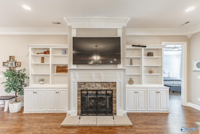 108 NW Rockhaven Dr, Madison, AL 35757 - unfurnished living room featuring wood finished floors, crown molding, a fireplace, baseboards, and a ceiling fan