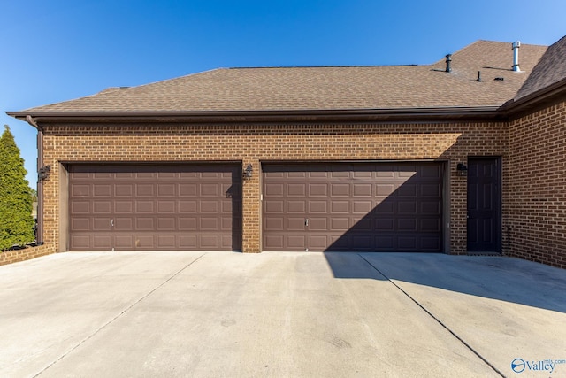 108 NW Rockhaven Dr, Madison, AL 35757 - garage featuring driveway