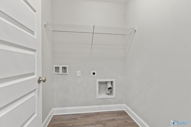 laundry area featuring hookup for a washing machine, hookup for an electric dryer, dark wood finished floors, baseboards, and laundry area
