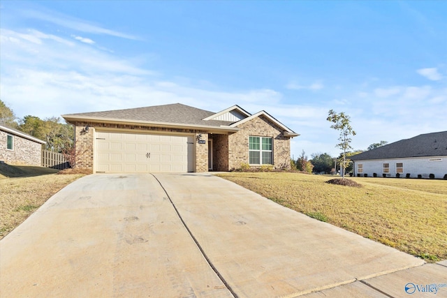 ranch-style house featuring concrete driveway, an attached garage, brick siding, and a front lawn