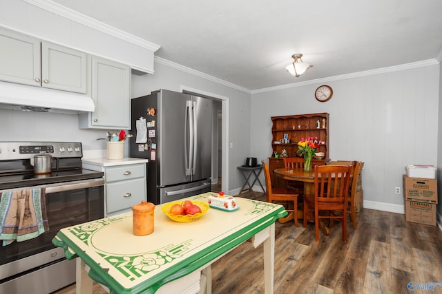 kitchen with appliances with stainless steel finishes, dark hardwood / wood-style flooring, and crown molding