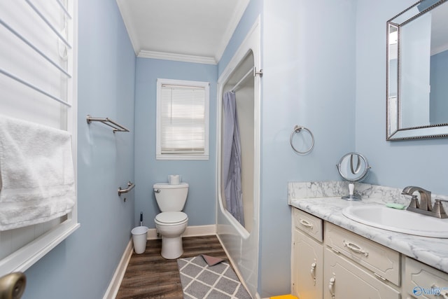 full bathroom featuring toilet, shower / bath combination with curtain, vanity, hardwood / wood-style floors, and crown molding