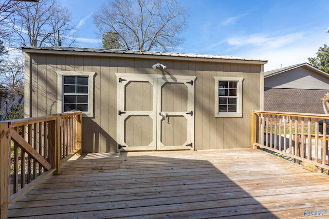 deck featuring a storage shed