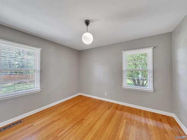 1011 Cole Dr SE, Huntsville, AL 35802 - empty room featuring baseboards and light wood-type flooring