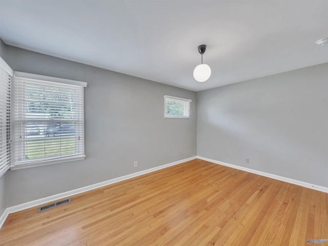 1011 Cole Dr SE, Huntsville, AL 35802 - unfurnished room featuring baseboards and wood finished floors