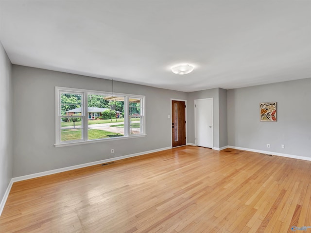 1011 Cole Dr SE, Huntsville, AL 35802 - empty room featuring light wood-type flooring and baseboards