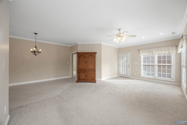 unfurnished living room with ornamental molding, ceiling fan with notable chandelier, and light colored carpet