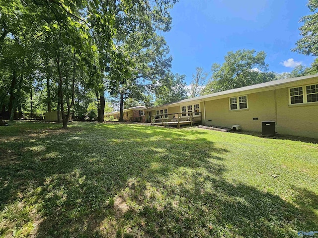 view of yard featuring a deck