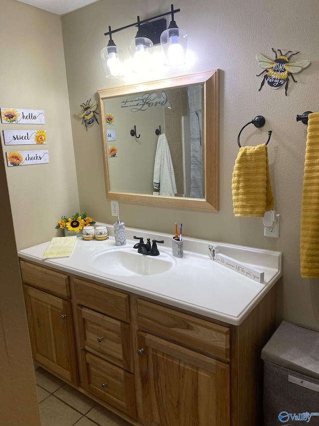 bathroom featuring tile patterned floors and vanity