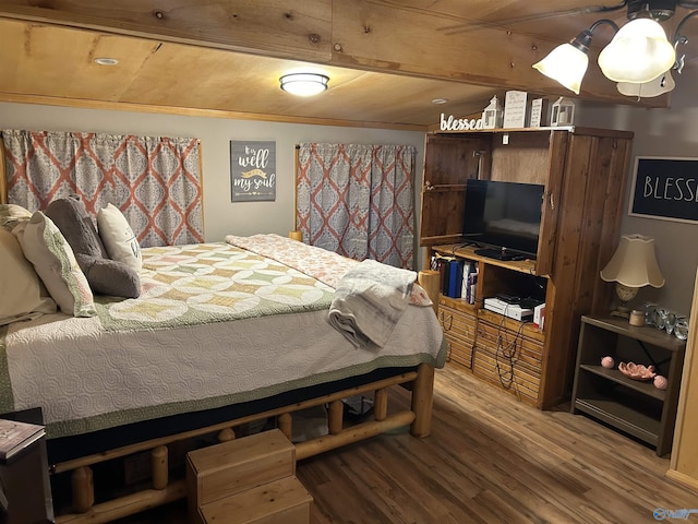 bedroom featuring hardwood / wood-style flooring