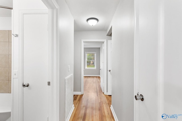 corridor featuring light hardwood / wood-style flooring