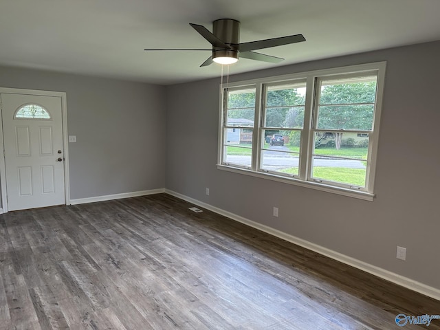 2022 Bide A Wee Dr NE, Huntsville, AL 35801 - unfurnished living room featuring baseboards, dark wood-style flooring, and ceiling fan