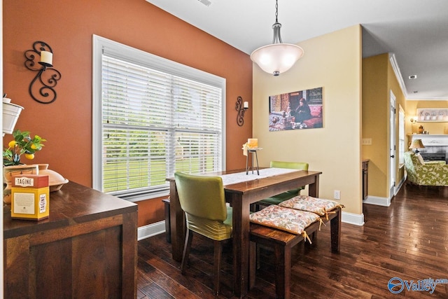 126 Mattie Ct, Madison, AL 35756 - dining area with dark wood-type flooring and baseboards