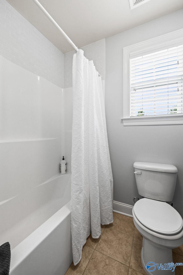 126 Mattie Ct, Madison, AL 35756 - bathroom with shower / bath combo with shower curtain and tile patterned flooring