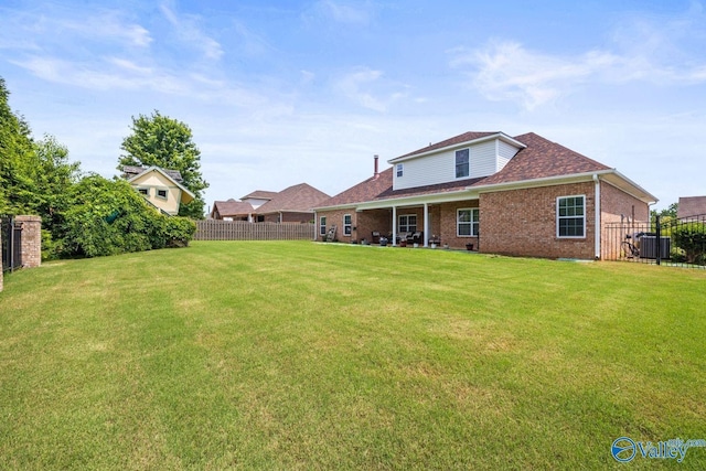 126 Mattie Ct, Madison, AL 35756 - rear view of house with brick siding and a shingled roof