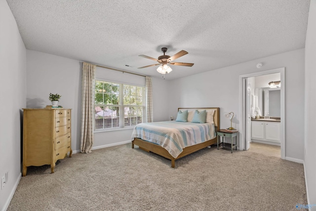 170 Jarrett Ln, Madison, AL 35758 - bedroom with a textured ceiling, light colored carpet, a ceiling fan, and connected bathroom