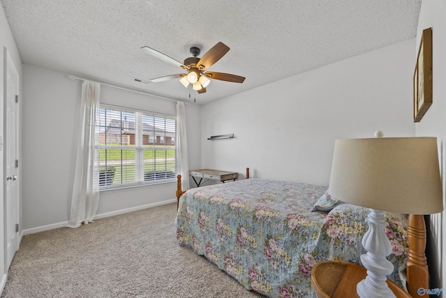 170 Jarrett Ln, Madison, AL 35758 - bedroom with a textured ceiling, carpet, and ceiling fan