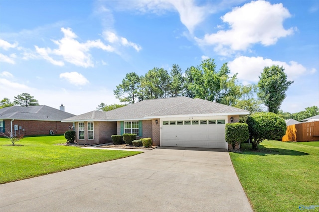 170 Jarrett Ln, Madison, AL 35758 - ranch-style house featuring an attached garage, concrete driveway, brick siding, and a shingled roof