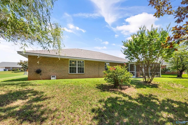 170 Jarrett Ln, Madison, AL 35758 - back of property with a yard and brick siding