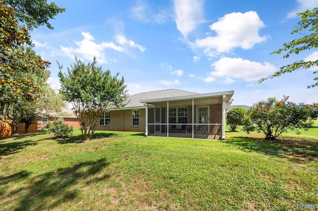 170 Jarrett Ln, Madison, AL 35758 - rear view of house featuring a sunroom and a yard