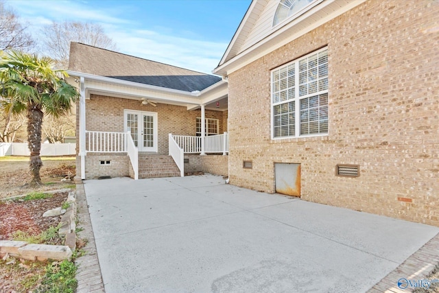 view of patio / terrace featuring french doors and a ceiling fan